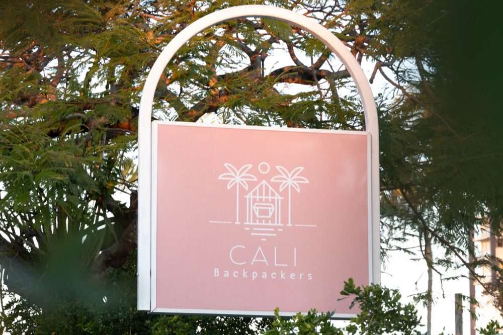 The CALI Backpackers sign